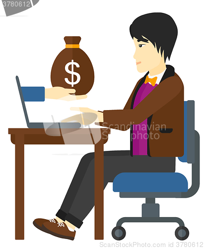 Image of Businessman working in office.