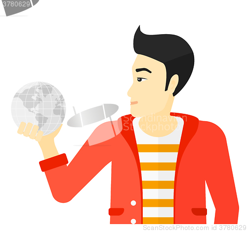 Image of Man holding globe.