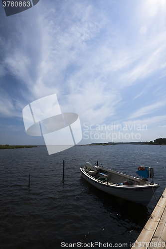 Image of jetty with a boat