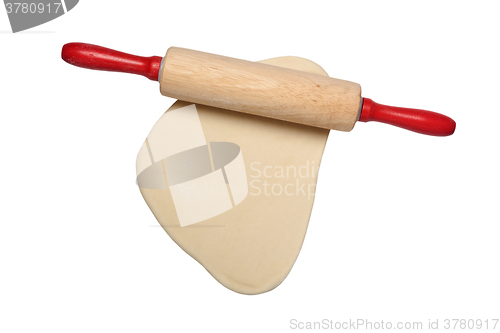 Image of Flattened dough with rolling pin