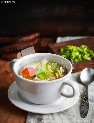 Image of bowl of chicken and vegetable soup