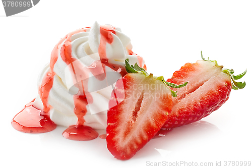 Image of whipped cream with strawberry sauce