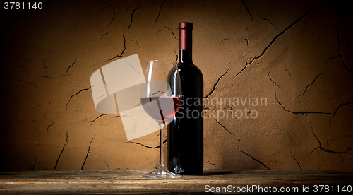 Image of Clay wall and wine