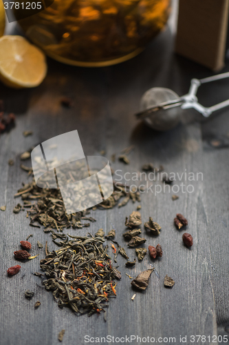Image of berries  tea composition