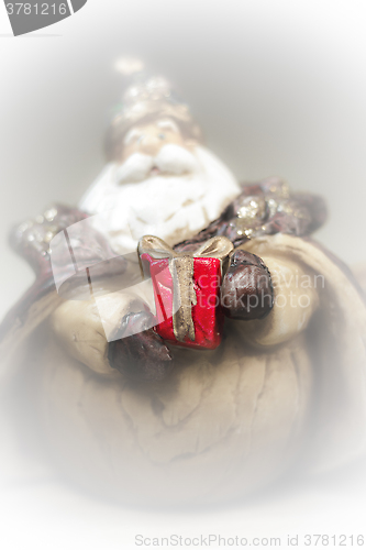 Image of a gift from Santa Claus. White smoke