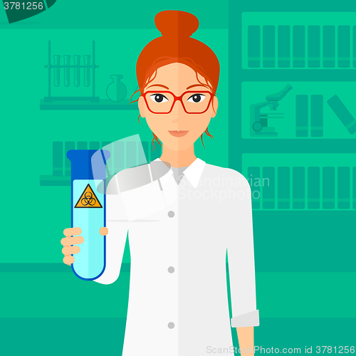 Image of Laboratory assistant with test tube.