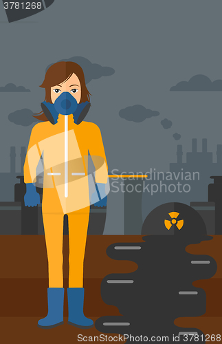 Image of Woman in protective chemical suit.