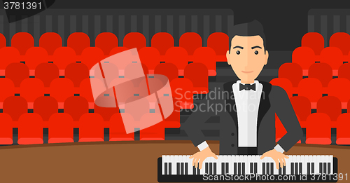 Image of Man playing piano.