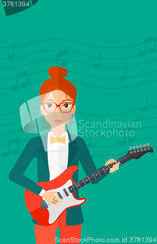 Image of Musician playing electric guitar.