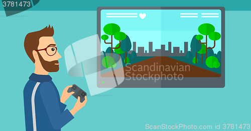 Image of Man playing video game.