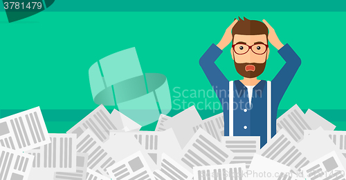 Image of Man in stack of newspapers.