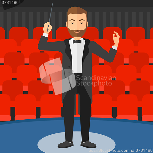 Image of Conductor directing with baton.