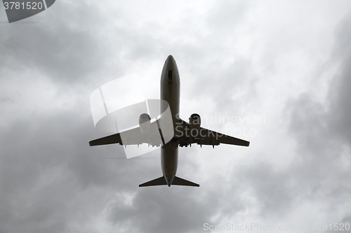 Image of Airplane Silhouette, Overcast Sky