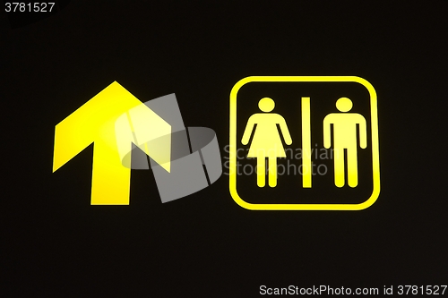 Image of Toilet sign with arrow