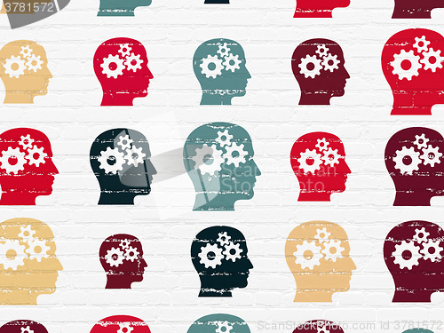 Image of Business concept: Head With Gears icons on wall background
