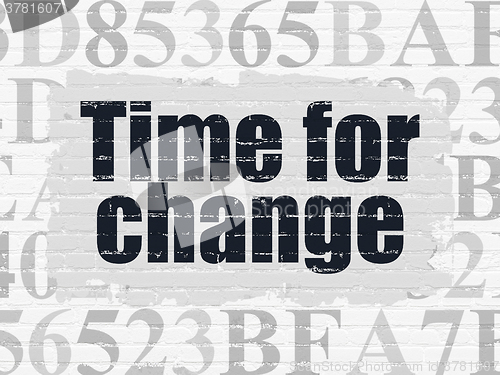 Image of Time concept: Time for Change on wall background