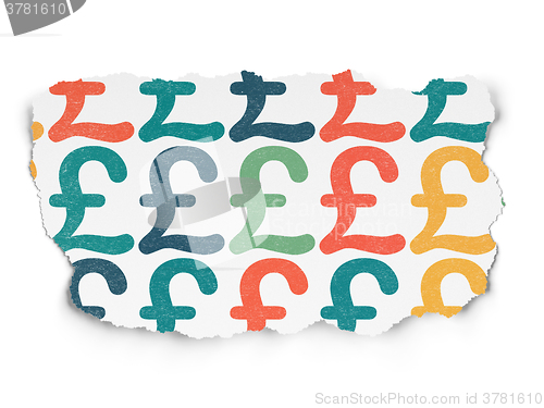 Image of Currency concept: Pound icons on Torn Paper background