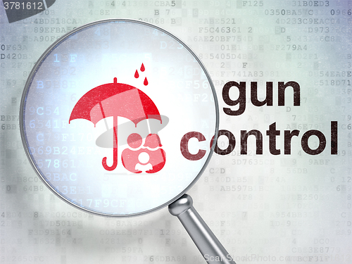 Image of Protection concept: Family And Umbrella and Gun Control with optical glass