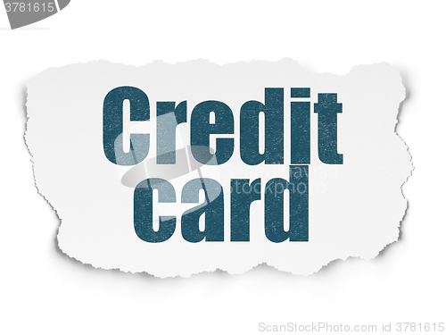 Image of Banking concept: Credit Card on Torn Paper background