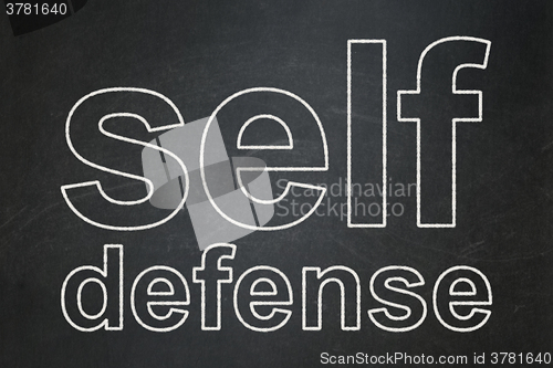 Image of Privacy concept: Self Defense on chalkboard background