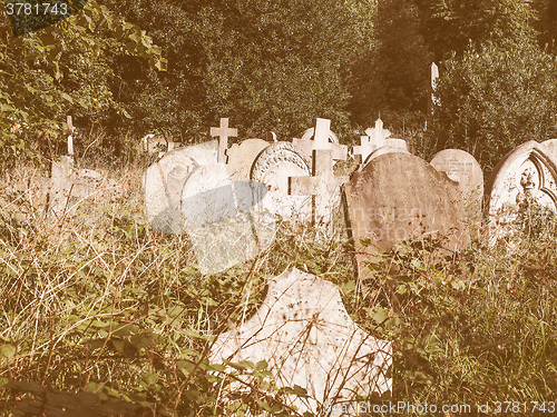 Image of Tombs and crosses at goth cemetery vintage