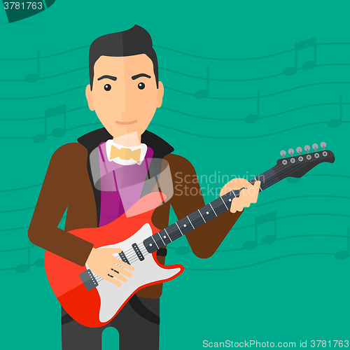 Image of Musician playing electric guitar.