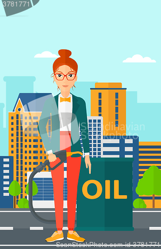 Image of Woman with oil can and filling nozzle.