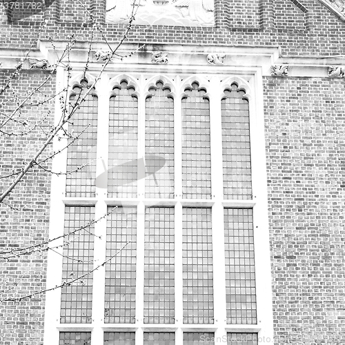 Image of old windon in england london brick and glass the wall 