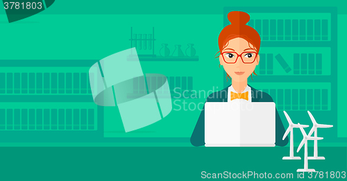 Image of Woman working at laptop. 