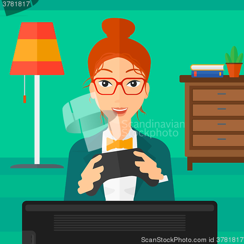 Image of Woman playing video game.