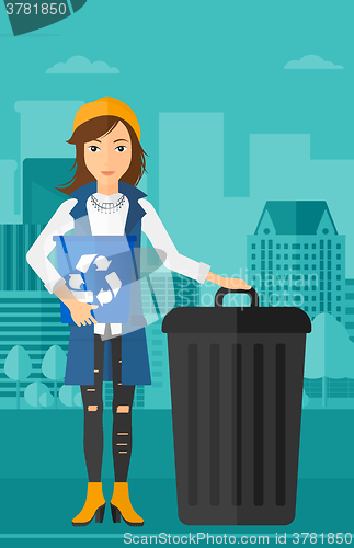 Image of Woman with recycle bins.