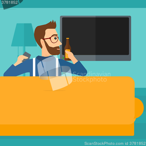 Image of Man watching TV.