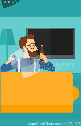 Image of Man watching TV.