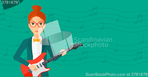 Image of Musician playing electric guitar.