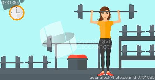 Image of Woman lifting barbell.