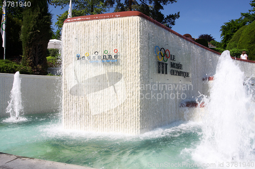 Image of LAUSANNE, SWITZERLAND - MAY 24, 2010: Fountain and Signboard at 