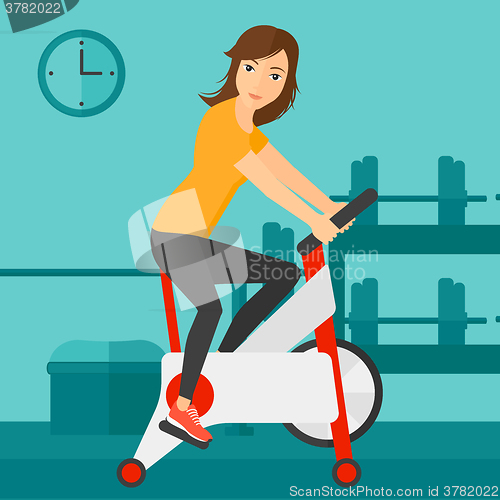 Image of Woman doing cycling exercise.