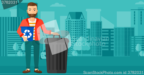 Image of Man with recycle bins.