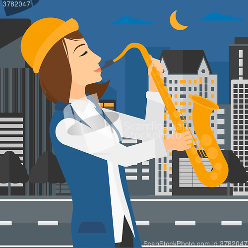 Image of Woman playing saxophone.
