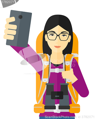 Image of Woman making selfie.