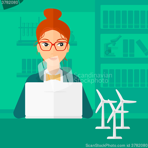 Image of Woman working at laptop. 