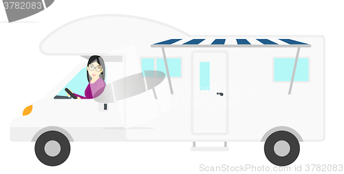 Image of Woman driving motor home.