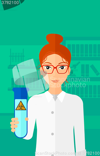 Image of Laboratory assistant with test tube.