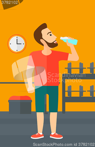Image of Man drinking water.