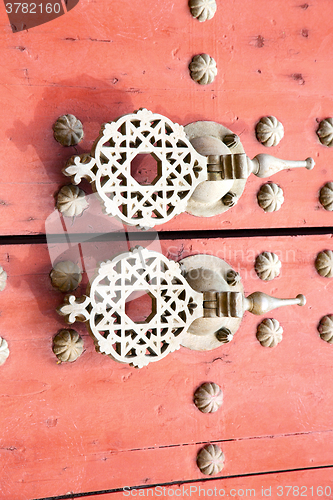 Image of metal rusty  brown    morocco in africa the old wood   padlock 