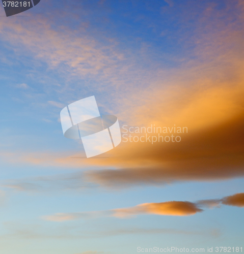 Image of sunrise in the colored sky white soft clouds and abstract backgr