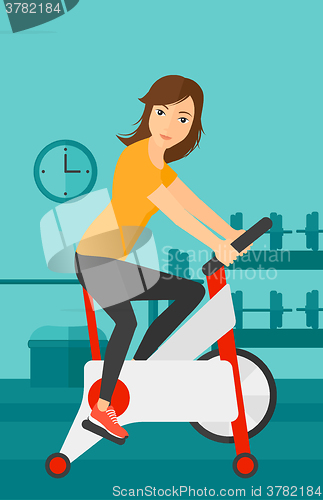 Image of Woman doing cycling exercise.