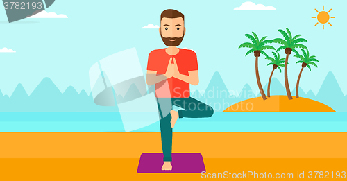 Image of Man practicing yoga.