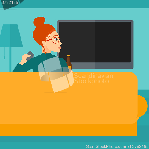 Image of Woman watching TV.
