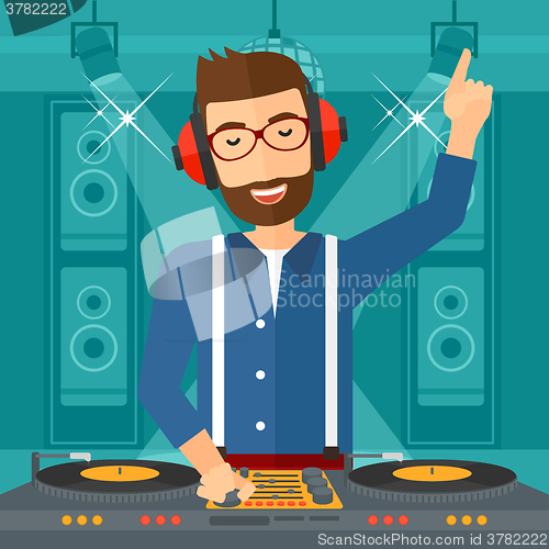 Image of Smiling DJ with console.